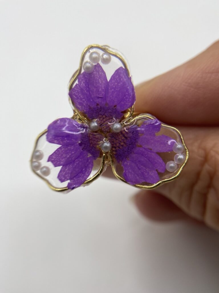 Bague perle violette