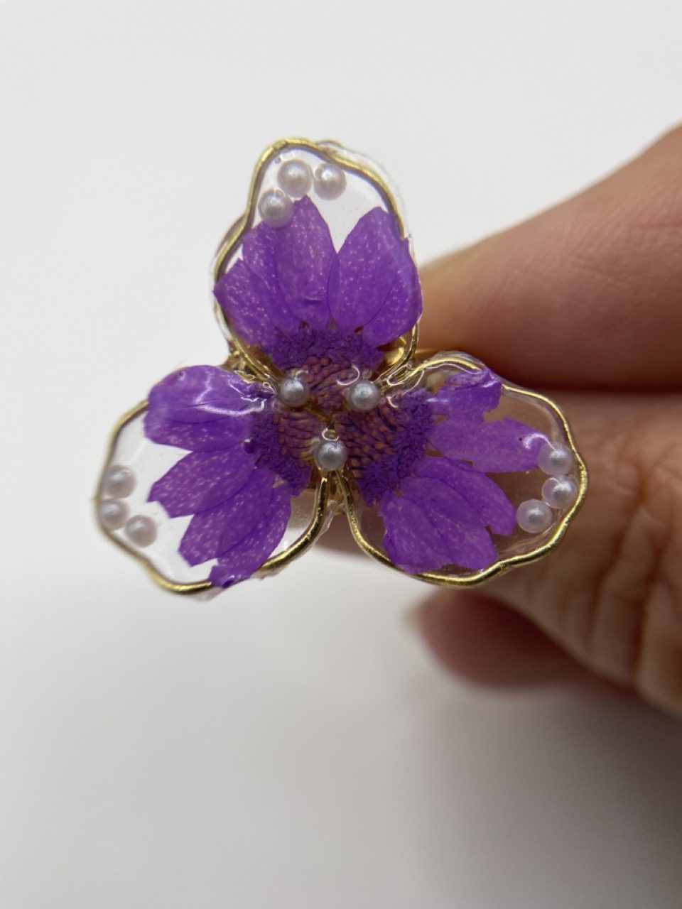 Bague perle violette
